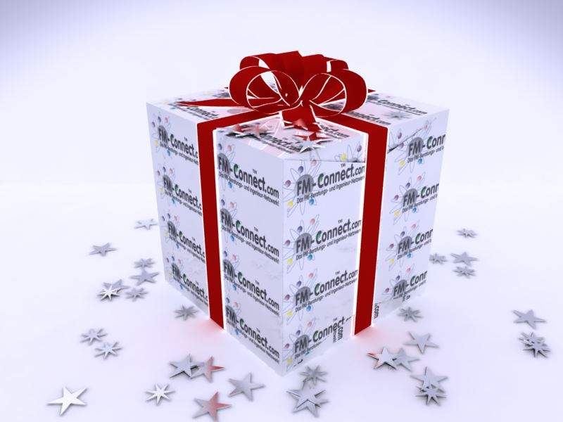 Geschenkbox mit FM-Connect Packpapier und einer roten Schleife